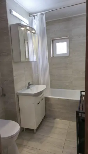 Apartament de închiriat în Arad, zona Alfa, cu 2 camere, decomandat, bucătărie spațioasă - imagine 2