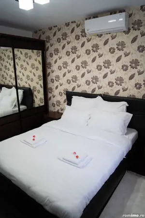 Regim hotelier in centru, cazare , apartament 2 camere la parter, vis a vi de Mc Donalds - imagine 2 Regim hotelier in centru, cazare , apartament 2 camere la parter, vis a vi de Mc Donalds - imagine 2