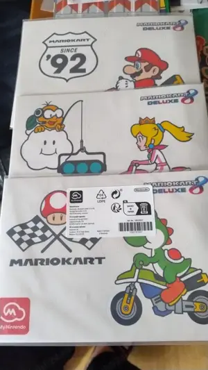 Nintendo Switch: Mario Kart 8 Deluxe +figurina Luigi Kart+collectibles - imagine 2