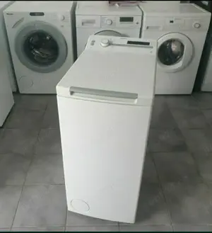 Masina de spălat rufe Whirlpool.  Cu deschidere verticală 