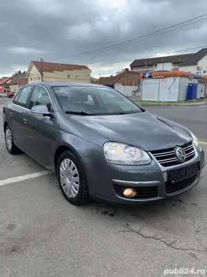 VW Jetta  Euro 4 2009 Benzina Simplu 1.6 MPI 102 CP BSE Impecabil - imagine 5