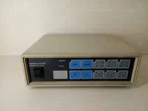 Switch pentru imprimante pe port paralel. Permite conectarea a 2 imprimante la 2 PC-uri.