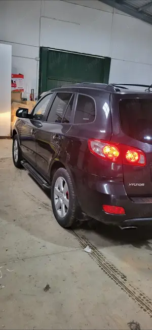 Hyundai SantaFe an 2009 - imagine 5
