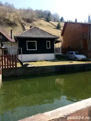 cabana montana cu piscina si sistem fotovoltaic