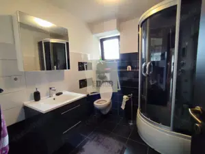 Casa cu 4 camere 3 bai garaj inchis si teren 1100 mp in Tocile - imagine 8