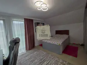 Casa cu 4 camere 3 bai garaj inchis si teren 1100 mp in Tocile - imagine 17