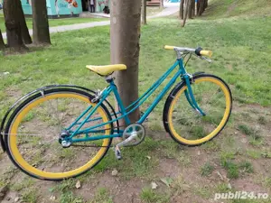 Bicicleta oras baiat si fata