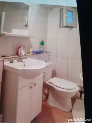 Două case,curte cu teren 972mp.la stradă asfaltată