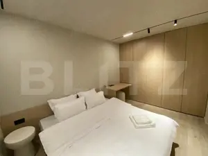 Apartament cu trei camere, 50 mp, ultrafinisat, zona Coada Lacului - imagine 3 Apartament cu trei camere, 50 mp, ultrafinisat, zona Coada Lacului - imagine 3