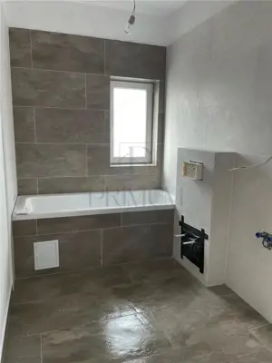 Sacalaz- toate utilitatile- strada asfaltata- dormitor cu baie si dressing- teren generos- incalzire