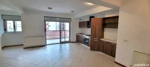 Apartament spațios cu 2 camere, transformabil în 3, terasă generoasă și finisaje - imagine 3