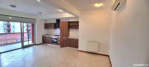 Apartament spațios cu 2 camere, transformabil în 3, terasă generoasă și finisaje - imagine 2