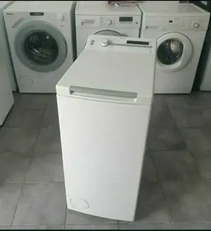 Masini de spalat rufe automate,  cu deschidere verticală. 