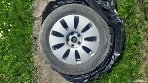 Două perechi de jante cu anvelope de iarna gama VAG si BMW