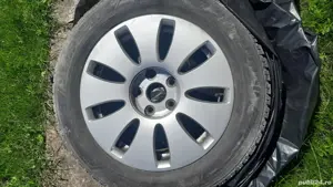 Două perechi de jante cu anvelope de iarna gama VAG si BMW - imagine 2