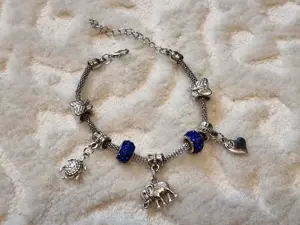 Bratara cu charmuri - imagine 2