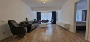 Apartament intr-un bloc nou, mobilat si utilat, loc de parcare