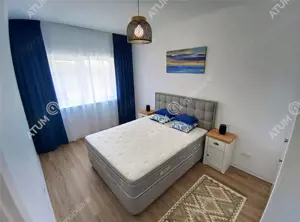 Apartament cu 3 camere 2 bai si parcare privata in Selimbar zona Brana - imagine 3