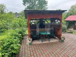 Casă de lemn cu teren generos – 1500 mp în Cerghid, liniște și natură - imagine 6