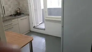 Oferim spre inchiriere garsoniera in zona Titan - imagine 2