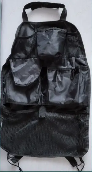 Husa protectue și organizatoar pentru scaunul masinii