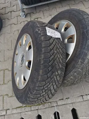 Jante de tabla pe 15'de golf 5 cu capace si anvelope de iarna Continental 195/65/15l  - imagine 3