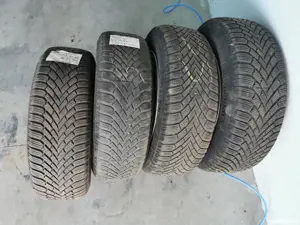 Jante de tabla pe 15'de golf 5 cu capace si anvelope de iarna Continental 195/65/15l  - imagine 2