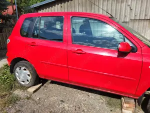 Vand autoturism Mazda2,rosu,2007,benzina 1.3, avariat fata - imagine 3