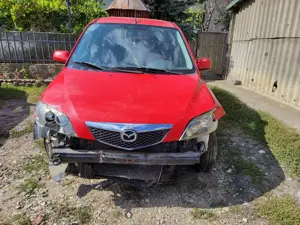 Vand autoturism Mazda2,rosu,2007,benzina 1.3, avariat fata - imagine 6