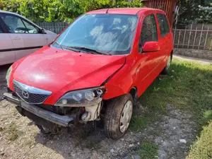 Vand autoturism Mazda2,rosu,2007,benzina 1.3, avariat fata - imagine 7