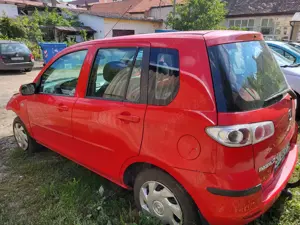 Vand autoturism Mazda2,rosu,2007,benzina 1.3, avariat fata