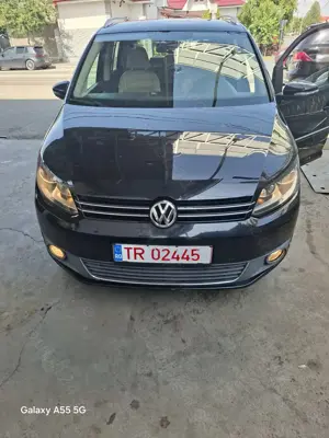 Vw touran 1,2 benzina, an 2011, 7 locuri, adus din Olanda,numere rosii