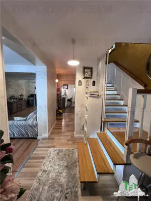 Vila individuala cuplata 4 camere S+P+1+M, cu incalzire in pardoseala, toate utilitatile si put fora