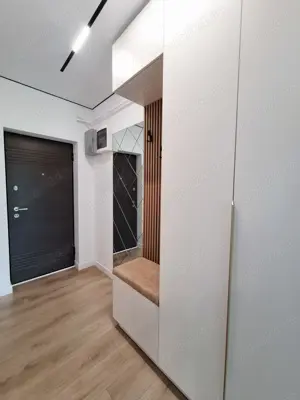 Apartament situat in BLOC NOU mobilat si utilat CT cu inc. in pard. loc de parcare - imagine 9