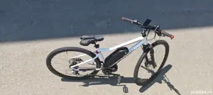 Bicicleta electrica cu motor 500 w cu acceleratie si autonomie peste 50 km in full electric