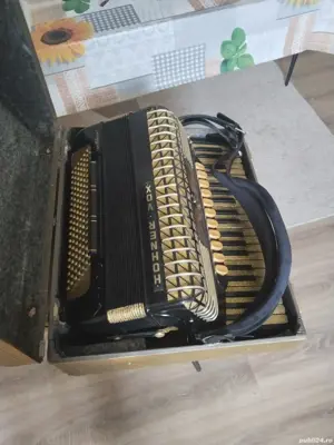 vand sau schimb cu unul cu 96 de basi  Acordeon Hohner Atlantic 4N DELUXE 120 bași 