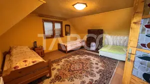 Casa de vanzare 6 camere loc de relaxare garaj teren 669mp Cornatel - imagine 7