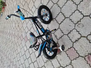 Vînd bicicletă copii cu roti ajutătoare 14 inchi