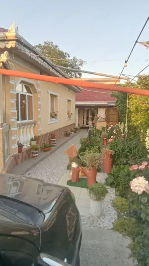 Vand casa din caramida + dependinte + teren 1500m2 in loc. Secuieni Noi, jud Neamt - imagine 3