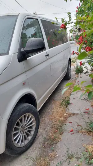 Volkswagen Transporter 2.0 TDI 8+1 locuri - imagine 2 Volkswagen Transporter 2.0 TDI 8+1 locuri - imagine 2