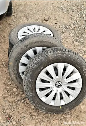 Jante din oțel cu cauciucuri de iarnă și capace - imagine 2