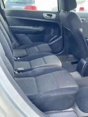 Peugeot 307 Diesel 7 locuri - imagine 12 Peugeot 307 Diesel 7 locuri - imagine 12