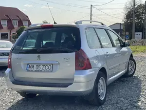 Peugeot 307 Diesel 7 locuri - imagine 8 Peugeot 307 Diesel 7 locuri - imagine 8