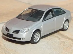 Macheta Nissan Primera III (P12) 2002 1:43 J Collection lipsuri uzata