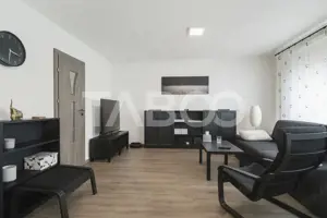 Casa de vanzare in Zavoi cu 3 camere 2 bai curte libera de 50 mp