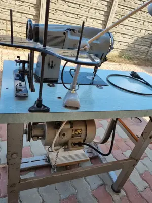 Mașina  cusut SINGER electrica