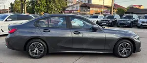 BMW Seria 3 318i AT - imagine 4