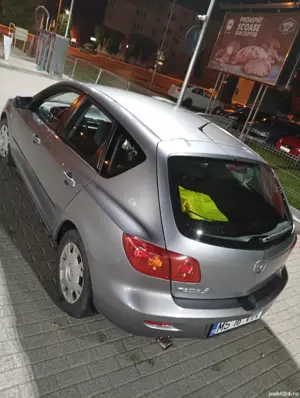 auto Mazda 3 .motor1.4 benzin - imagine 4