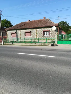 Casă cu teren de vânzare în Sărmășag