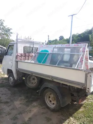 Camioane basculabil 3,5 nissan 